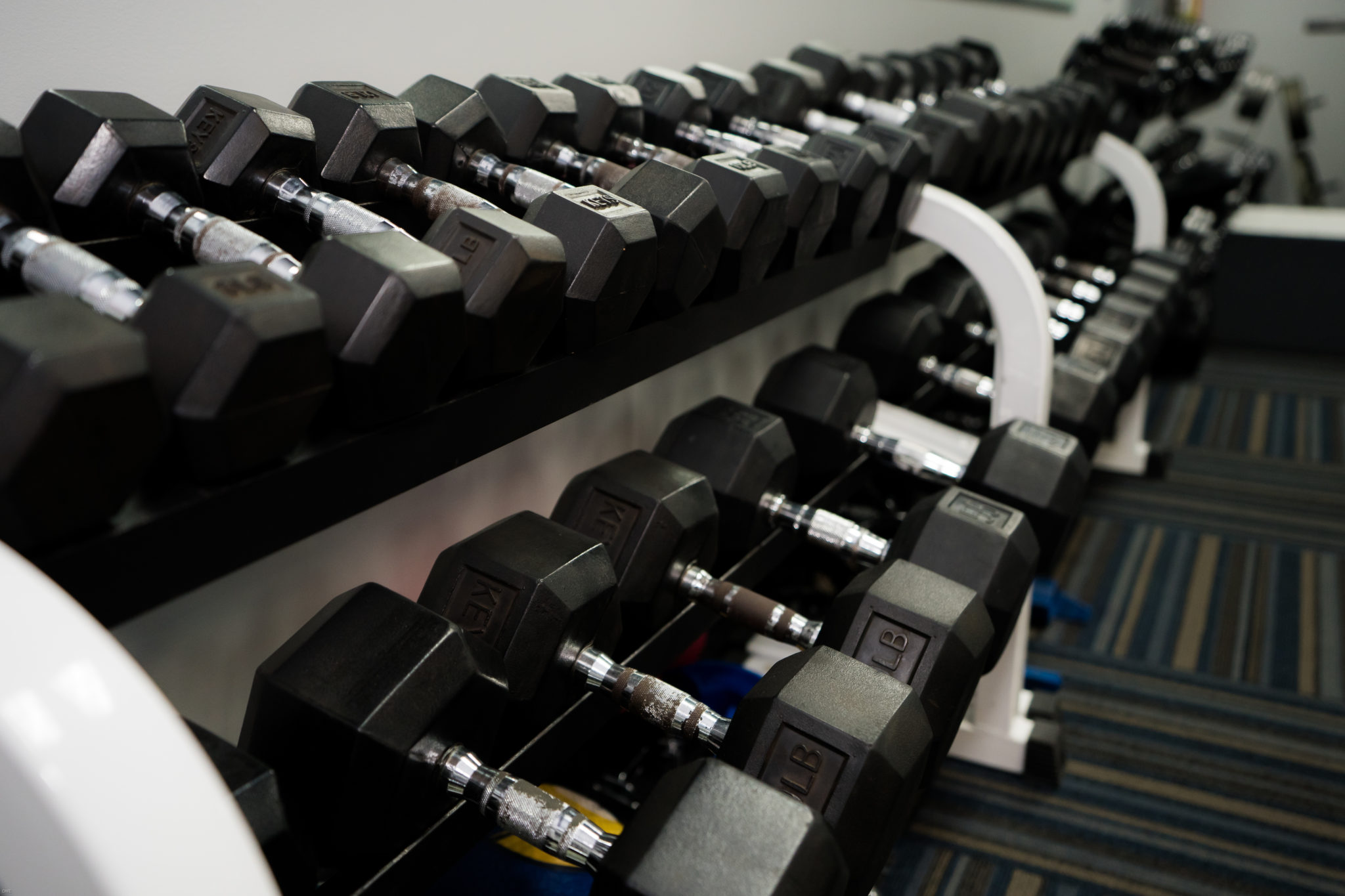 Fitness center with dumbells